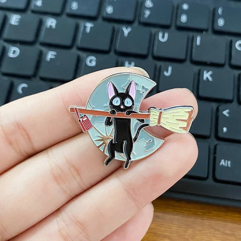 PIN GATO ESCOBA